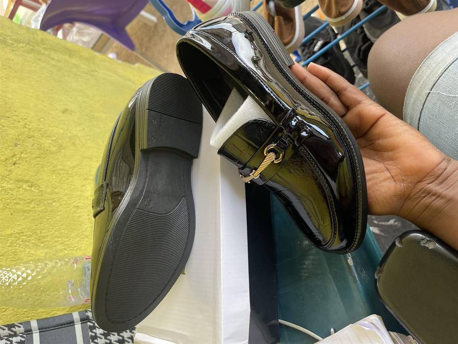 Boys dressing shoes