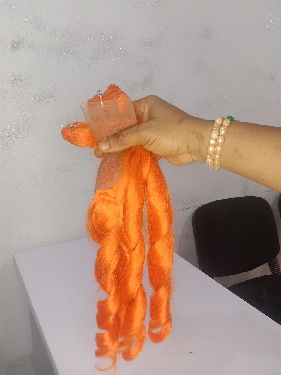 Orange curl hair.