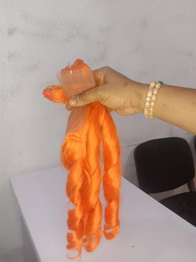 Orange curl hair.