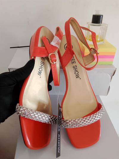 Orange low heel sandals