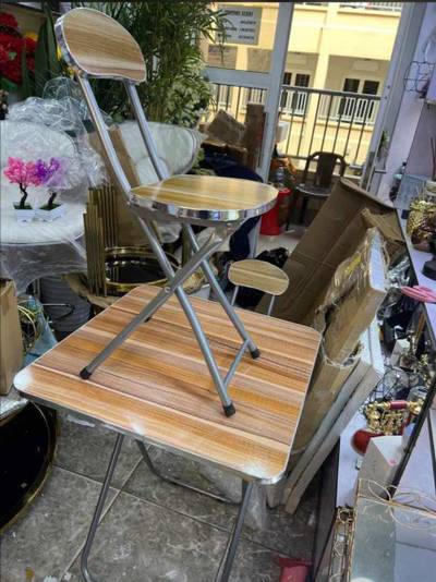 Moveable and foldable table and chair