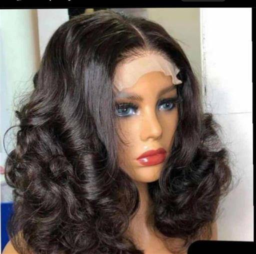 Double drawn curly wig