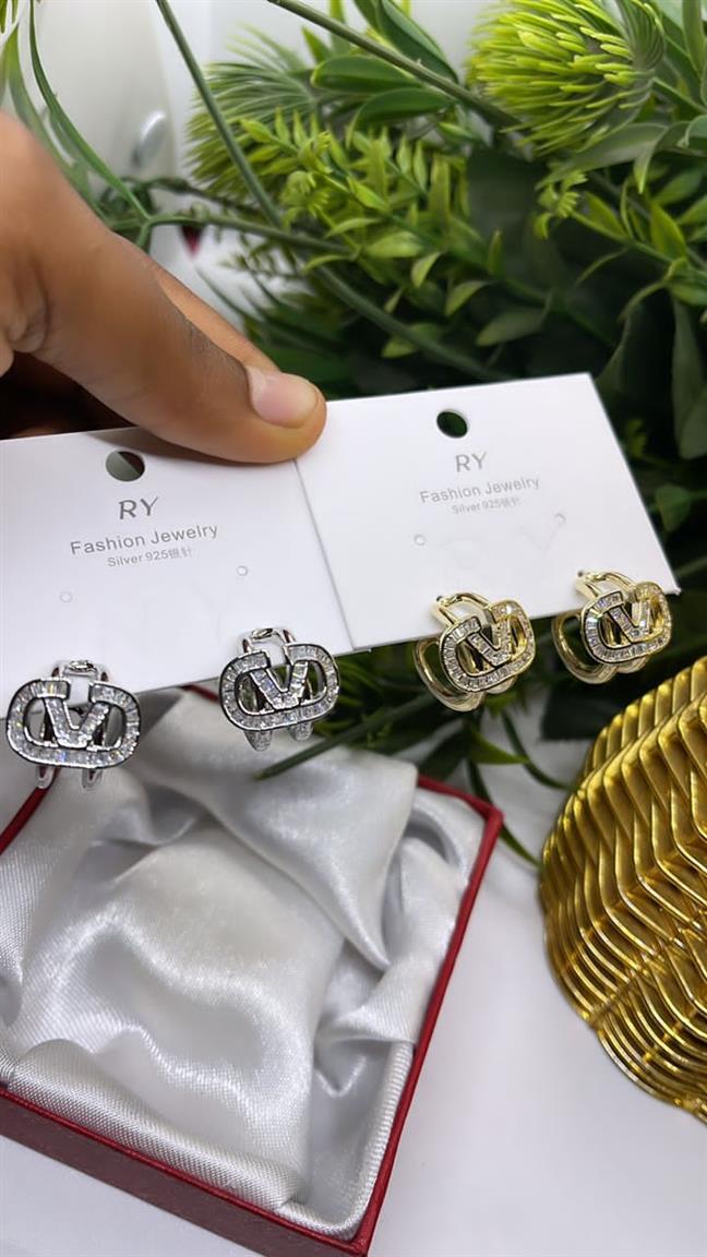 Silver and gold earrings