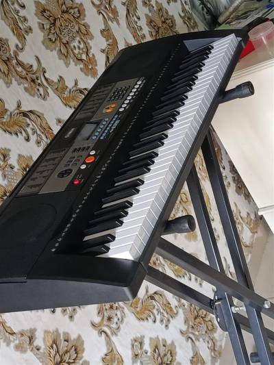 Yamaha keyboard piano with adapter and s