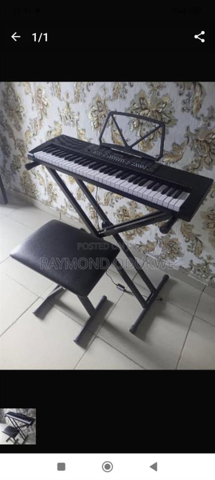 Keyboard piano with adapter and stand an