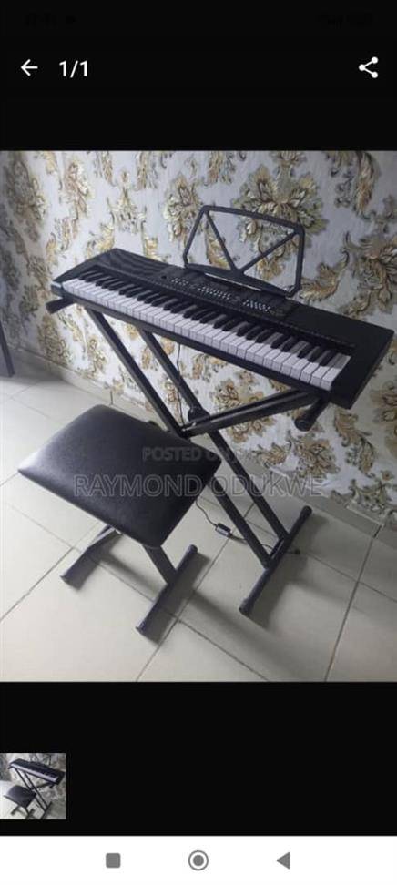 Keyboard piano with adapter and stand an