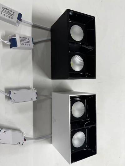 Square surface cantilever light available