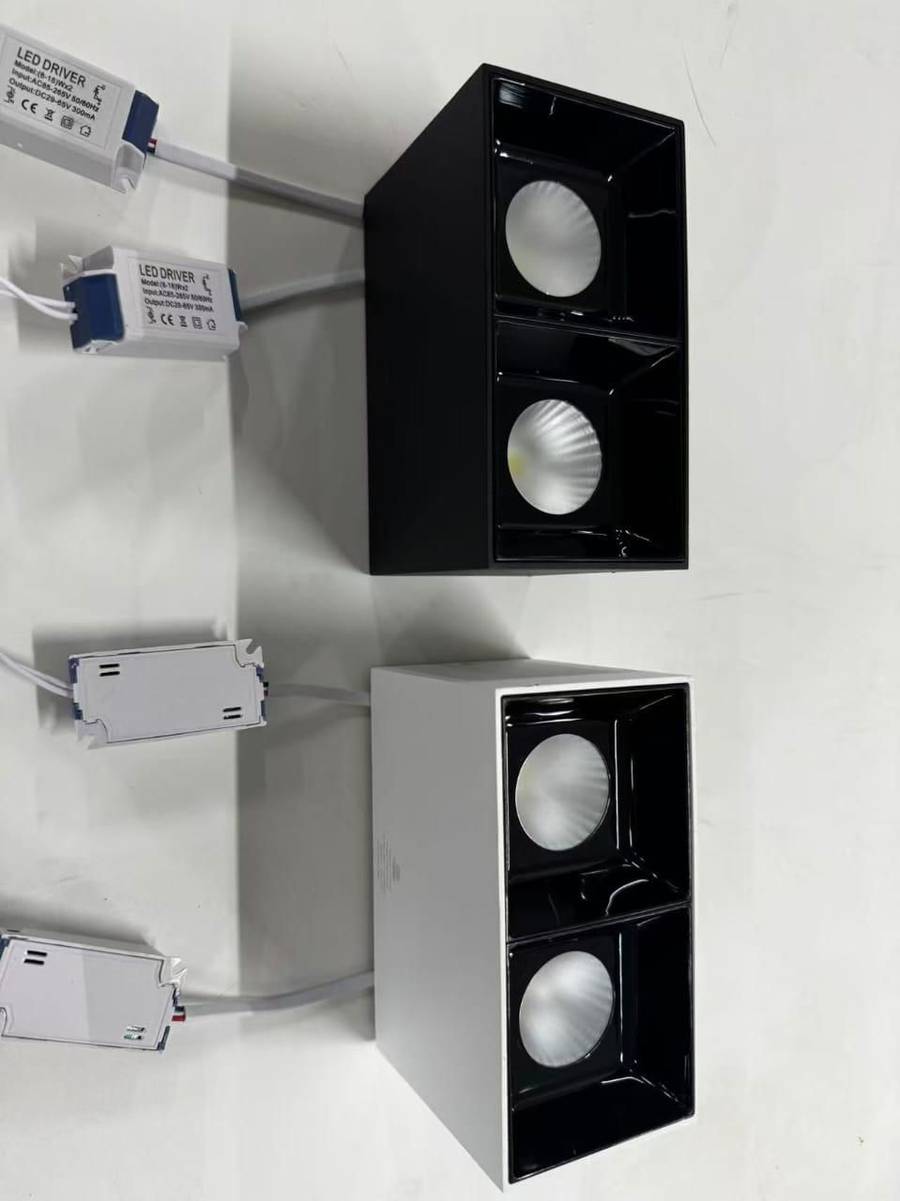 Square surface cantilever light available