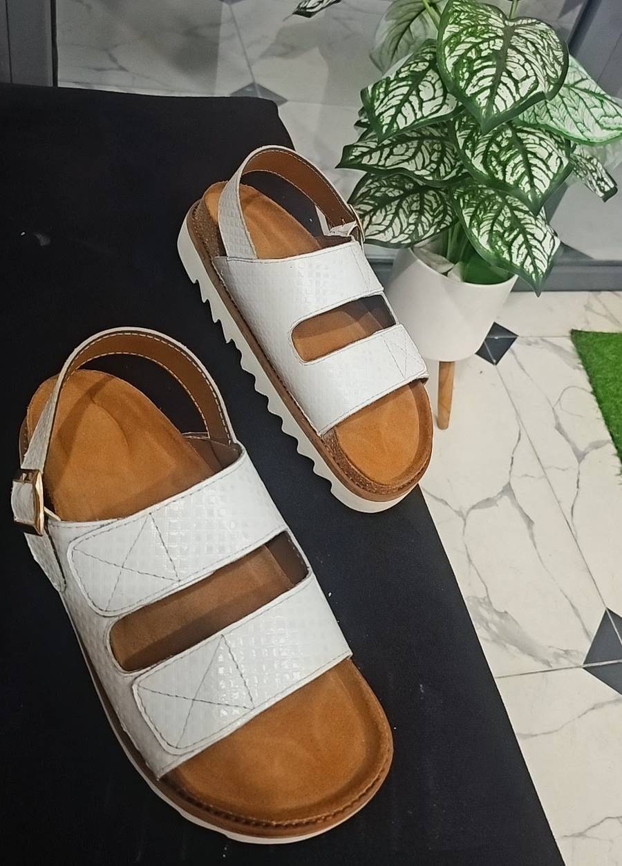 White perken slippers.